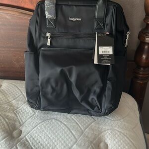 Black Backpack for women WATER-REPELLANT: Measures 11" W x 15" H x 6" D.